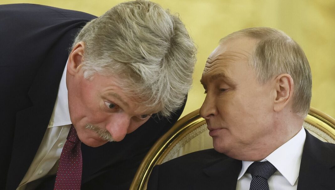 Дмитро Пєсков та Володимир Путін. Фото: AP